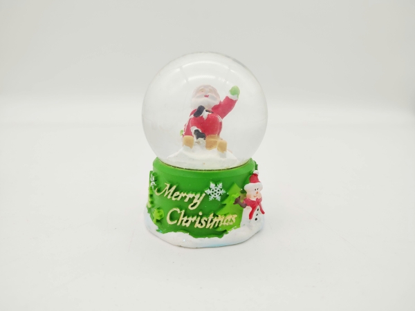 Snow globe Christmas figure Santa Claus sitting